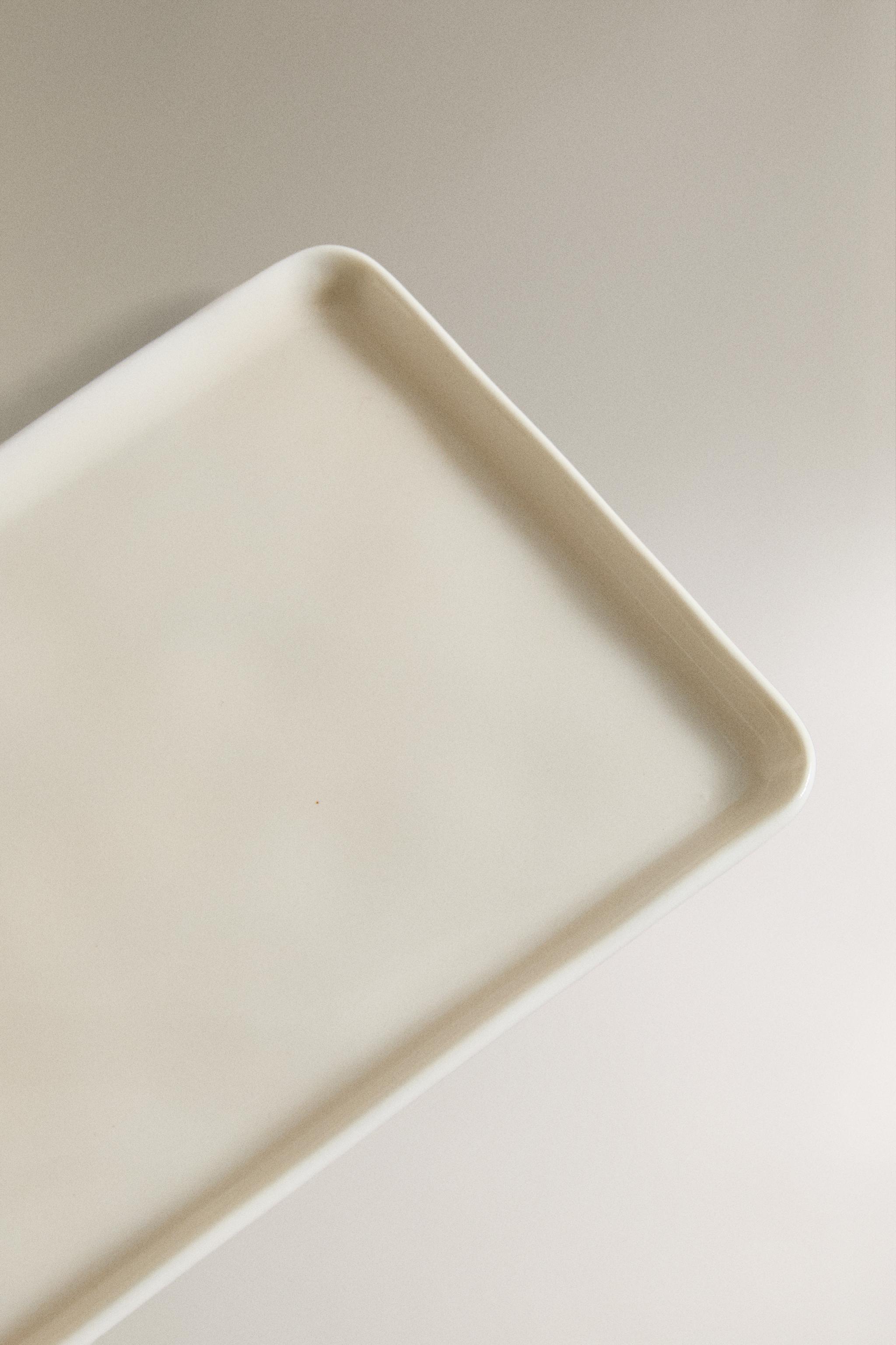 STONEWARE RAISED DESIGN BUTTER DISH